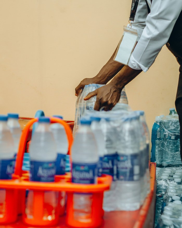 MANSA staff preparing vendor supplied drinks for an event